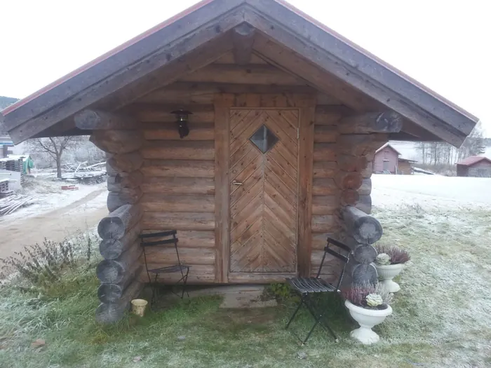 Traditionell timmerstuga av STH Bygg